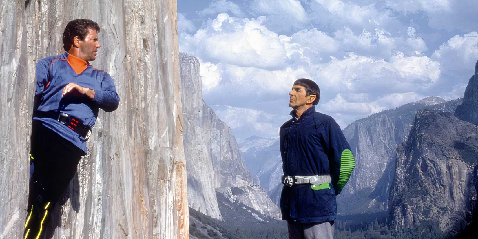 Kirk looks back at Spock as he climbs a mountain in Star Trek V: The Final Frontier