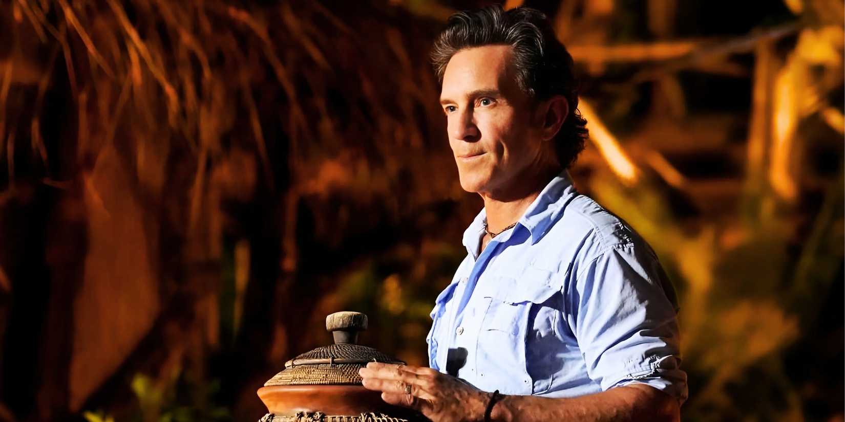 Survivor host Jeff Probst looks serious ahead of reading the votes at Tribal Council