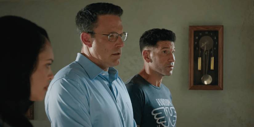 Ben Affleck and Jon Bernthal are looking at something in The Accountant 2