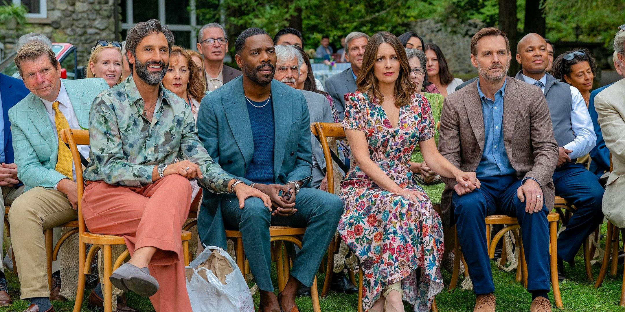 Claude (Marco Calvani), Danny (Colman Domingo), Kate (Tina Fey), and Jack (Will Forte) sitting at an event in The Four Seasons Season 1