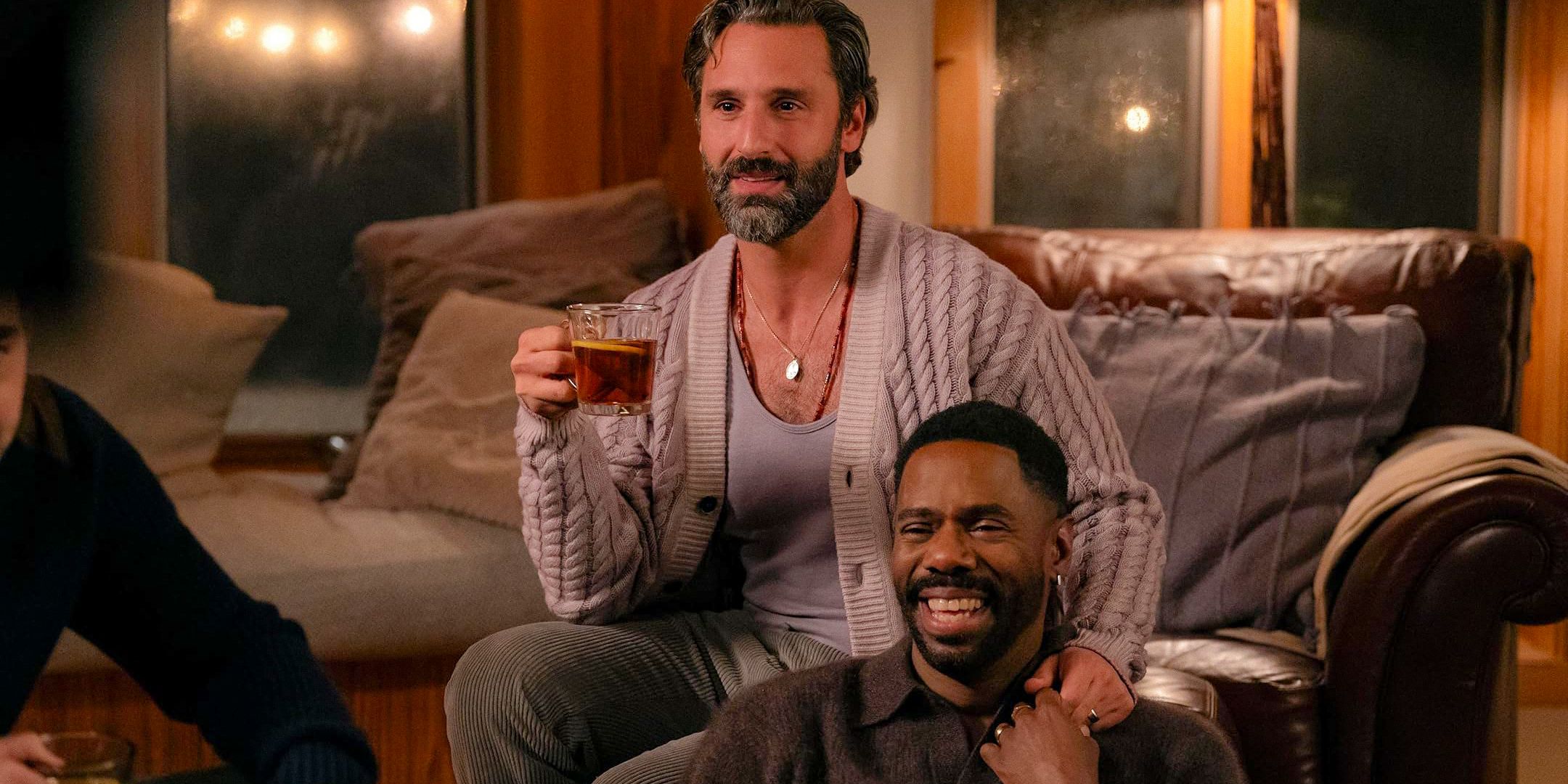 Danny (Colman Domingo) and Claude (Marco Calvani) relaxed and having fun in the living room in The Four Seasons Season 1