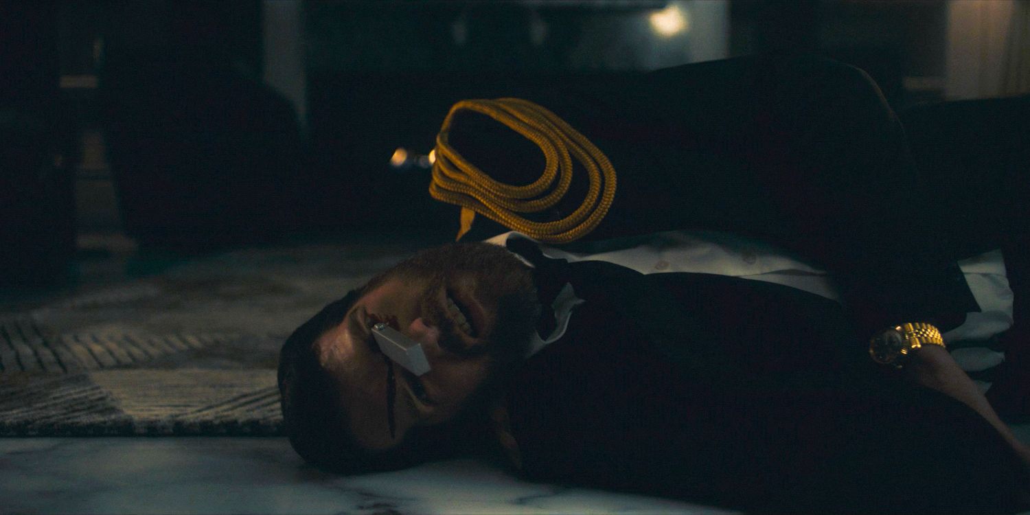 Commander Bell (Timothy Simons) with a knife lodged in his eye in The Handmaid's Tale Season 6 Ep 8