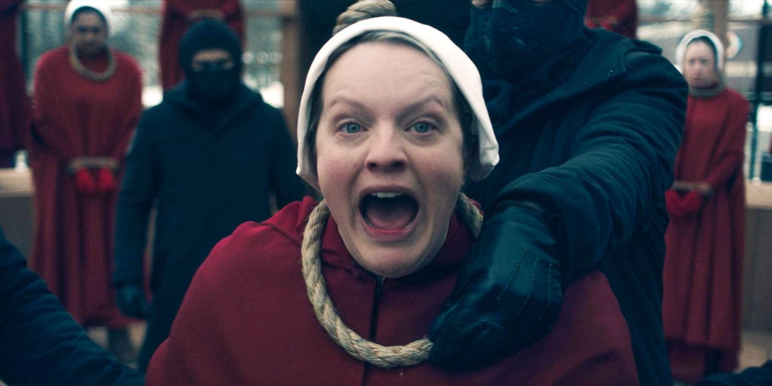 June (Elisabeth Moss) letting out a battle cry on the gallows in The Handmaid's Tale Season 6 Ep 9