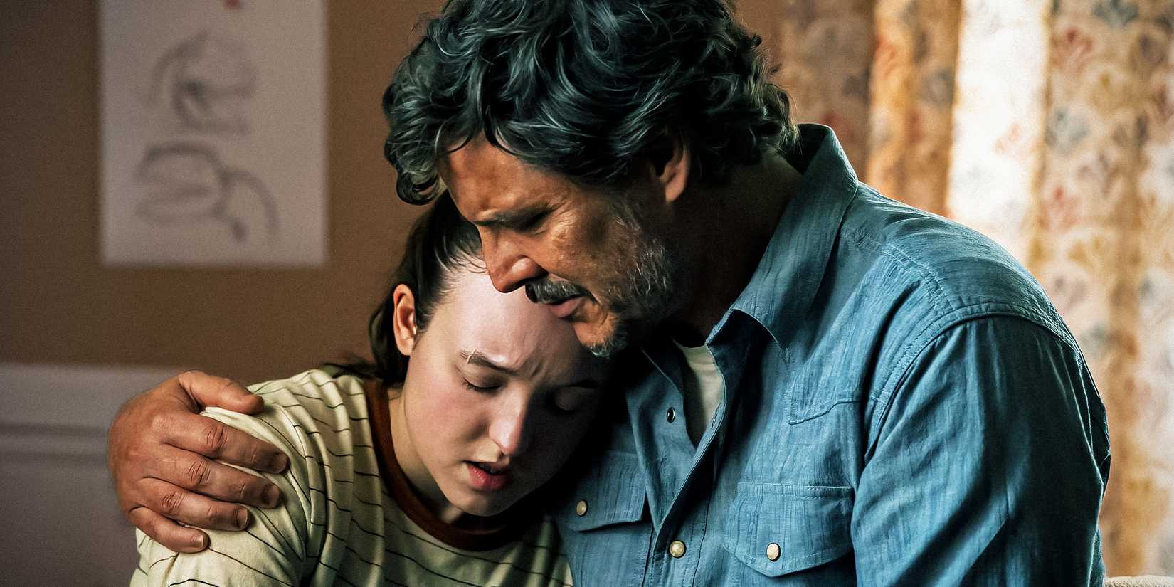 Joel hugging Ellie in The Last of Us