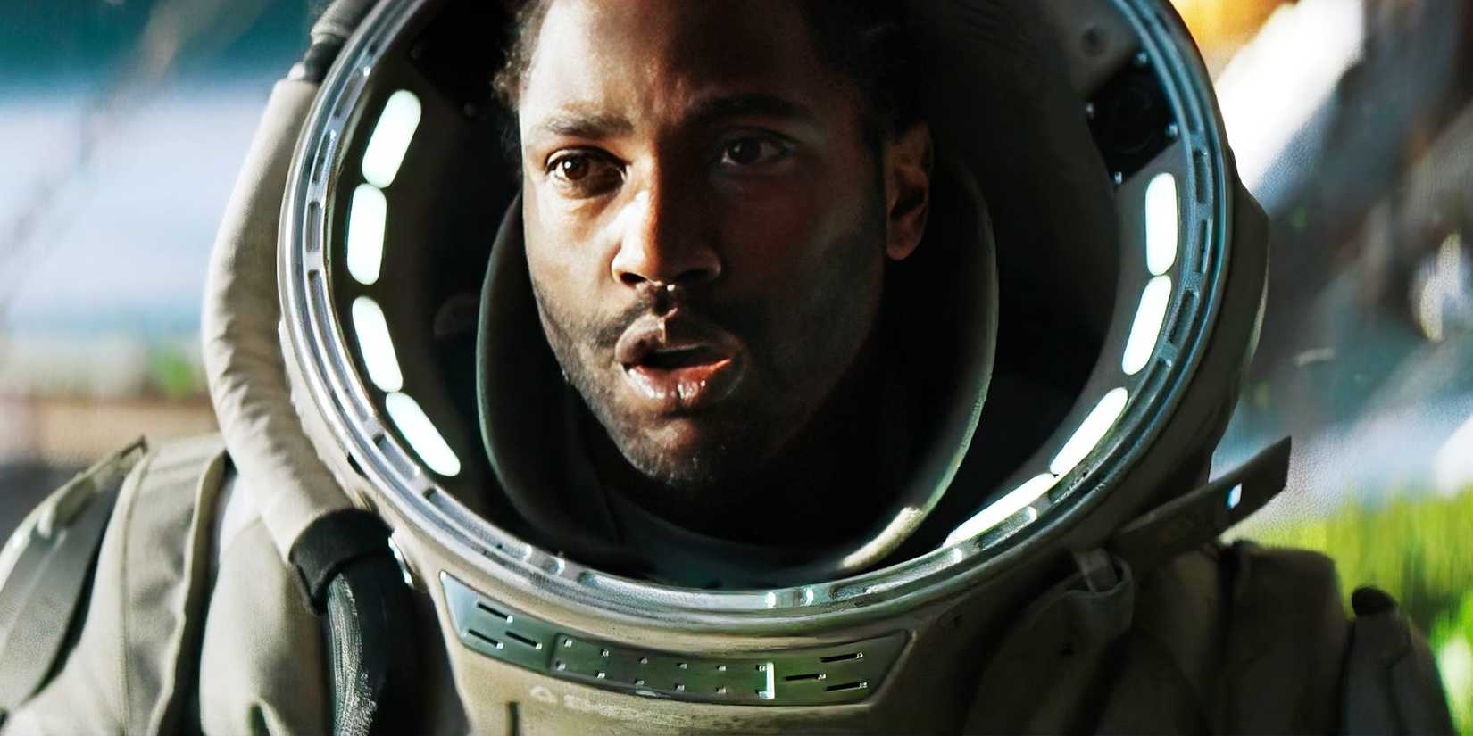 John David Washington looks shocked while wearing a space suit in The Creator