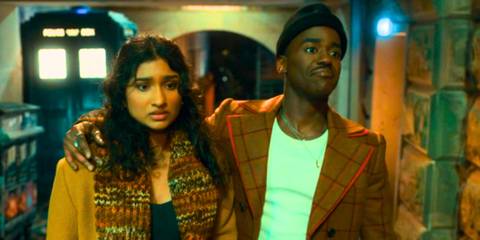 Ncuti Gatwa with his arm around Varada Sethu's Belinda Chandra in Doctor Who