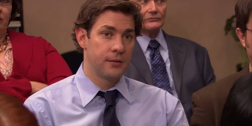 Jim Halpert looking defeated during a conference room meeting in The Office.