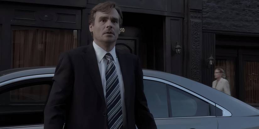 Wilson looking stunned as he discovers House is alive and outside his home in the House series finale.