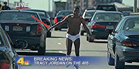 A news report of Tracy Jordan running in the street through traffic with a lightsaber in 30 Rock's pilot.