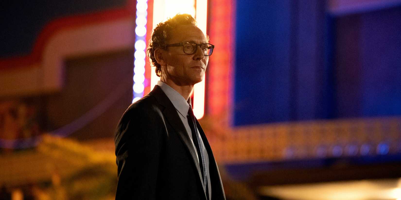 Tom Hiddleston is standing in Life of Chuck