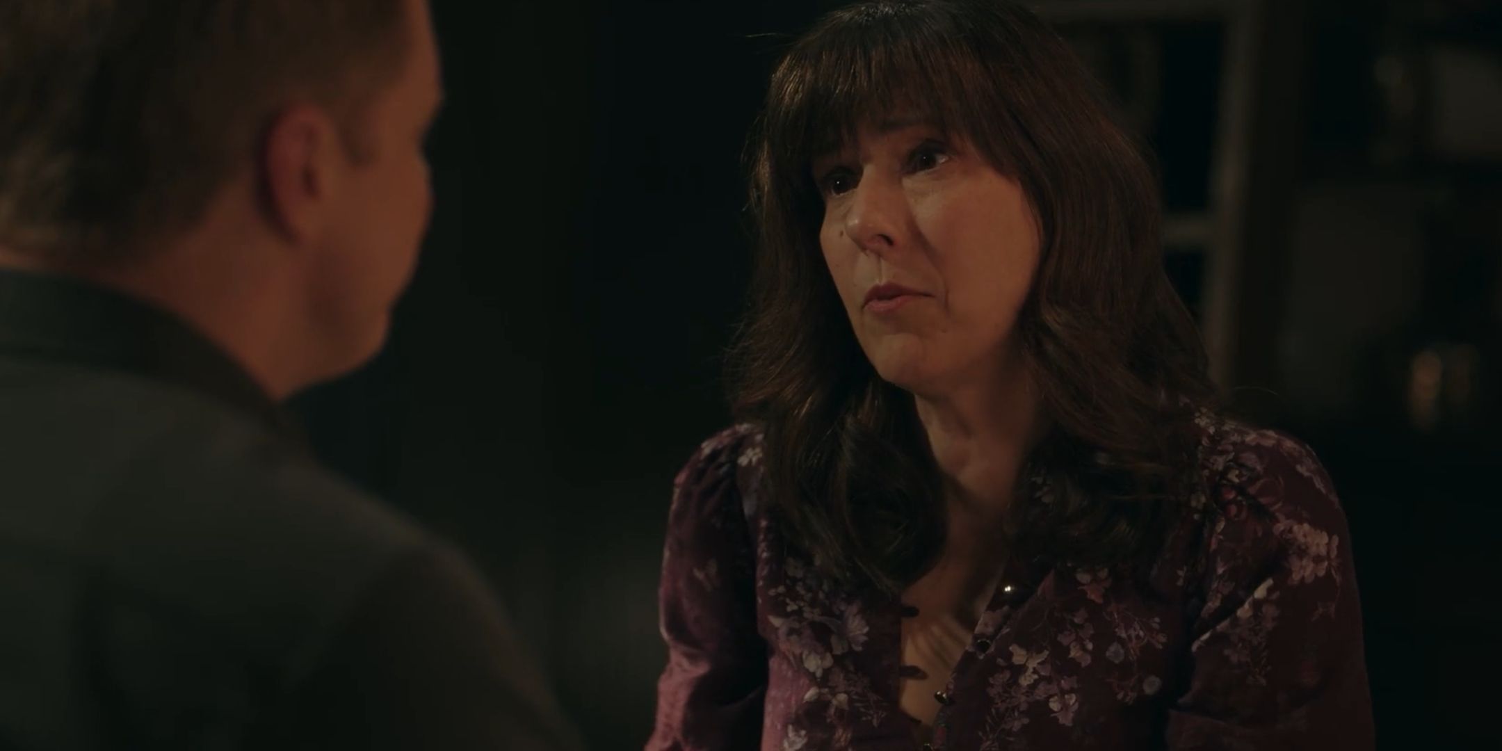 Heather talking to Harry in Resident Alien