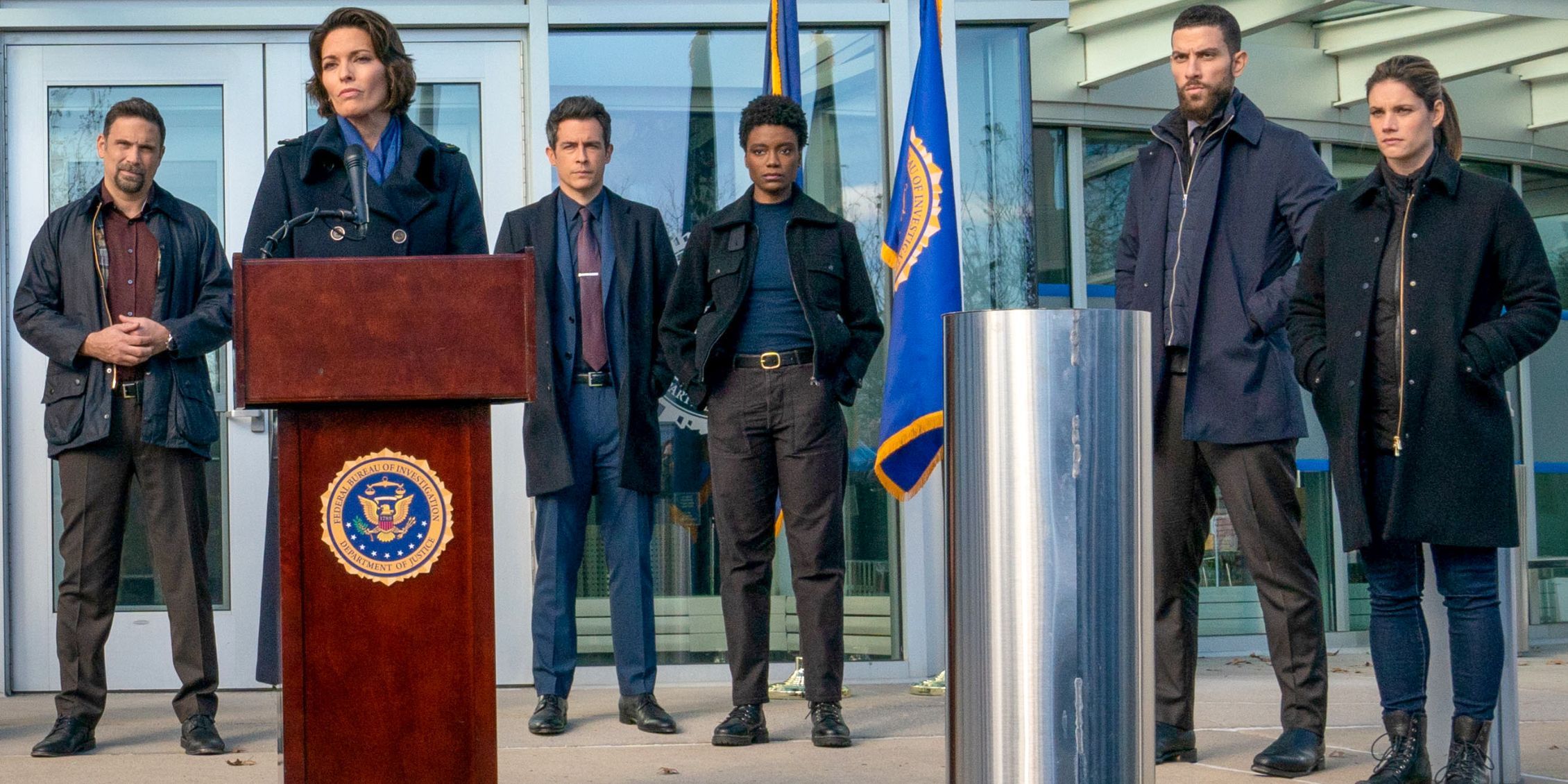 Isobel gives a press conference in FBI