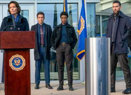 Isobel gives a press conference in FBI