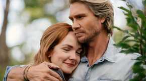 Cal (Chad Michael Murray) and Maggie (Morgan Kohan) embrace in Sullivan's Crossing