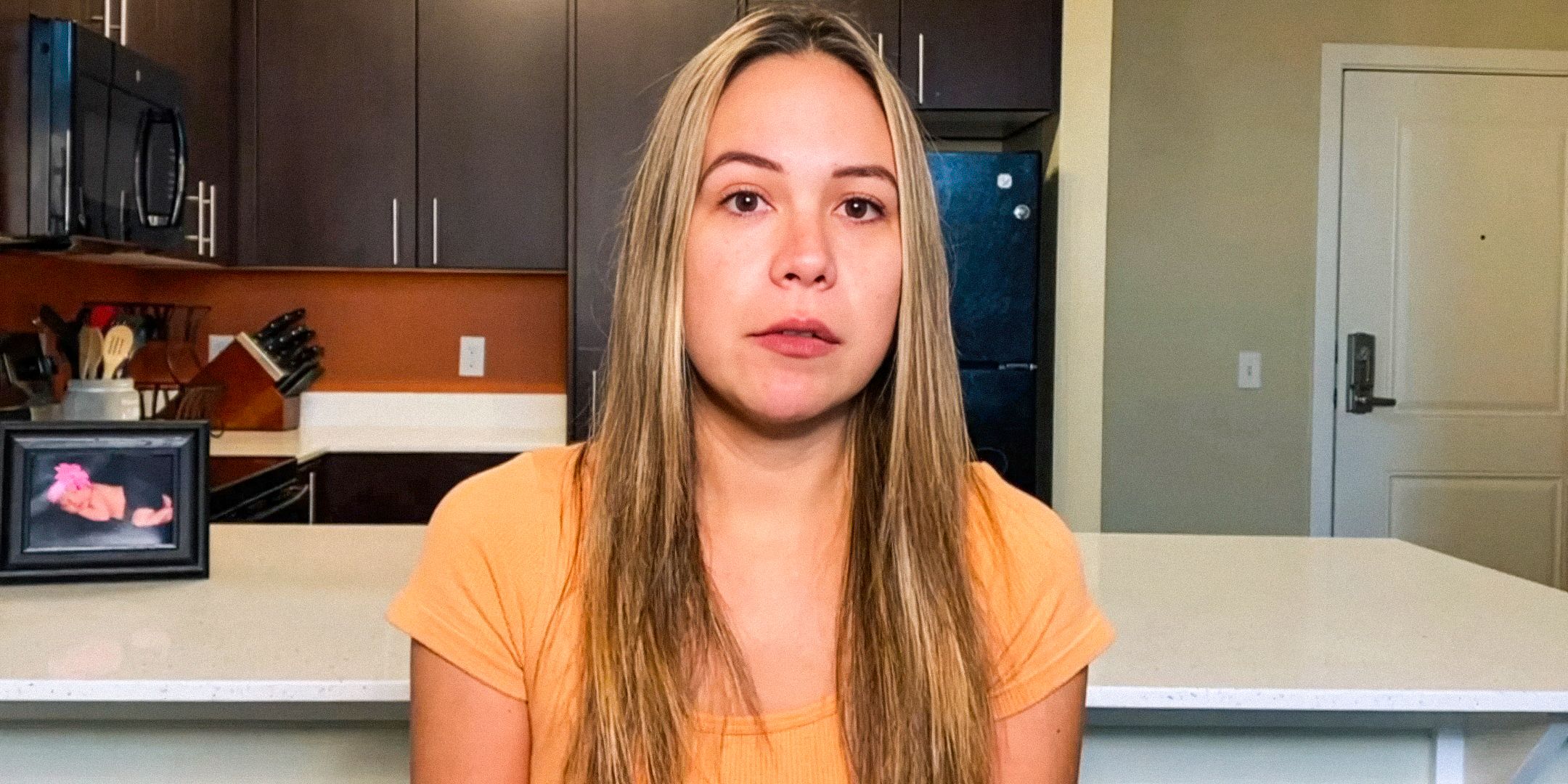 90 Day Fiancé’s Liz Woods with a serious expression, with a kitchen behind her