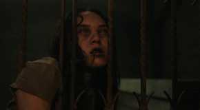 A zombified Ginny with her head pressed against her cell in The Walking Dead: Dead City season 2
