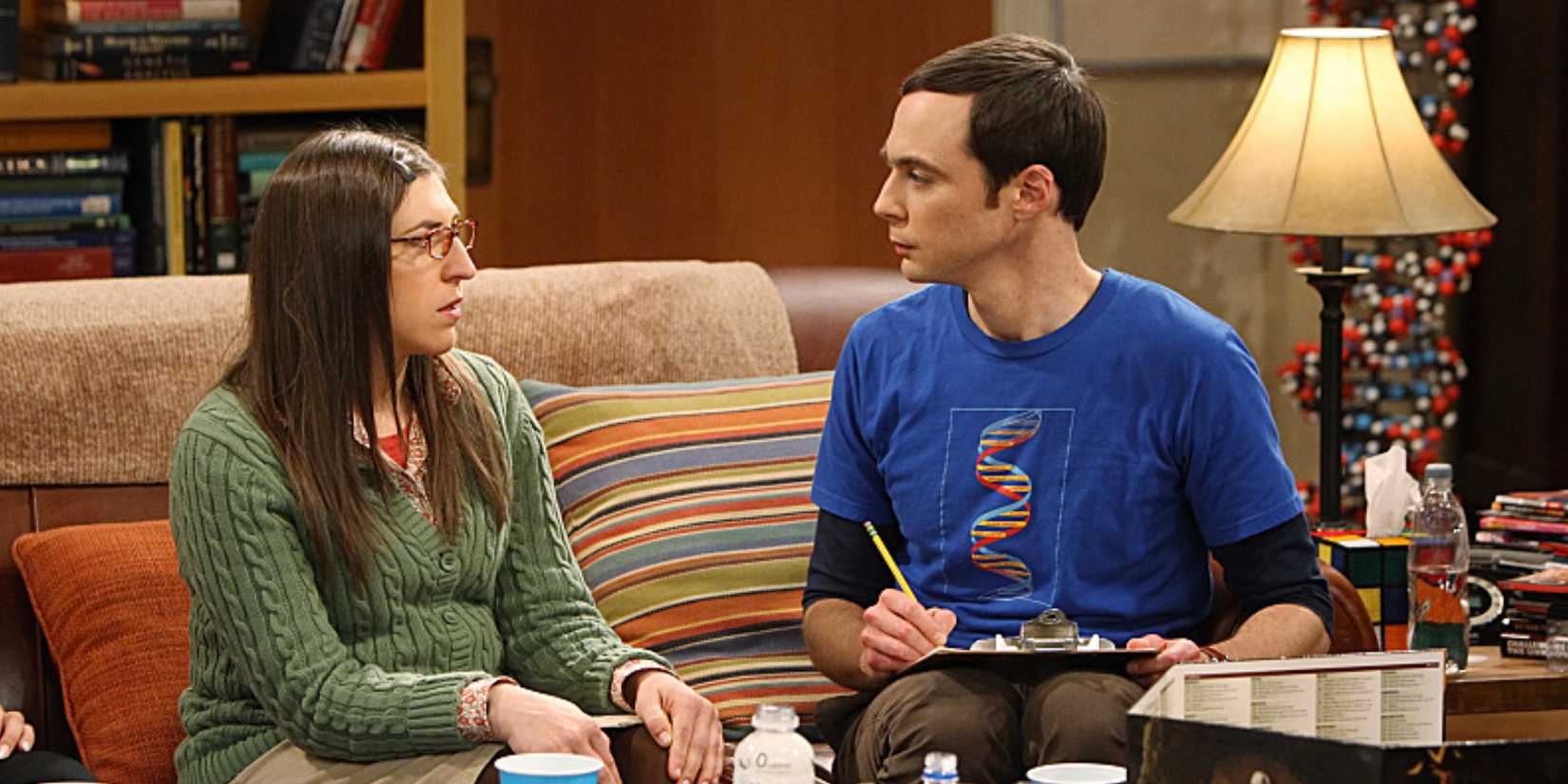 Amy and Sheldon look at one another apprehensively in The Love Spell Potential in The Big Bang Theory