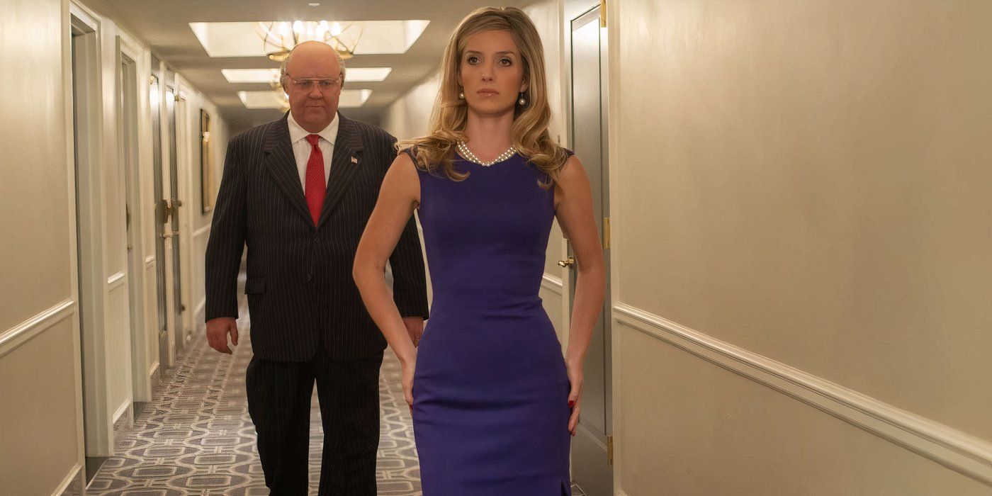 Critics Were Split About This Russell Crowe Show, But It's One Of His Best Performances Of All Time Annabelle Wallis and Russell Crowe walking together in Hotel hall in The Loudest Voice