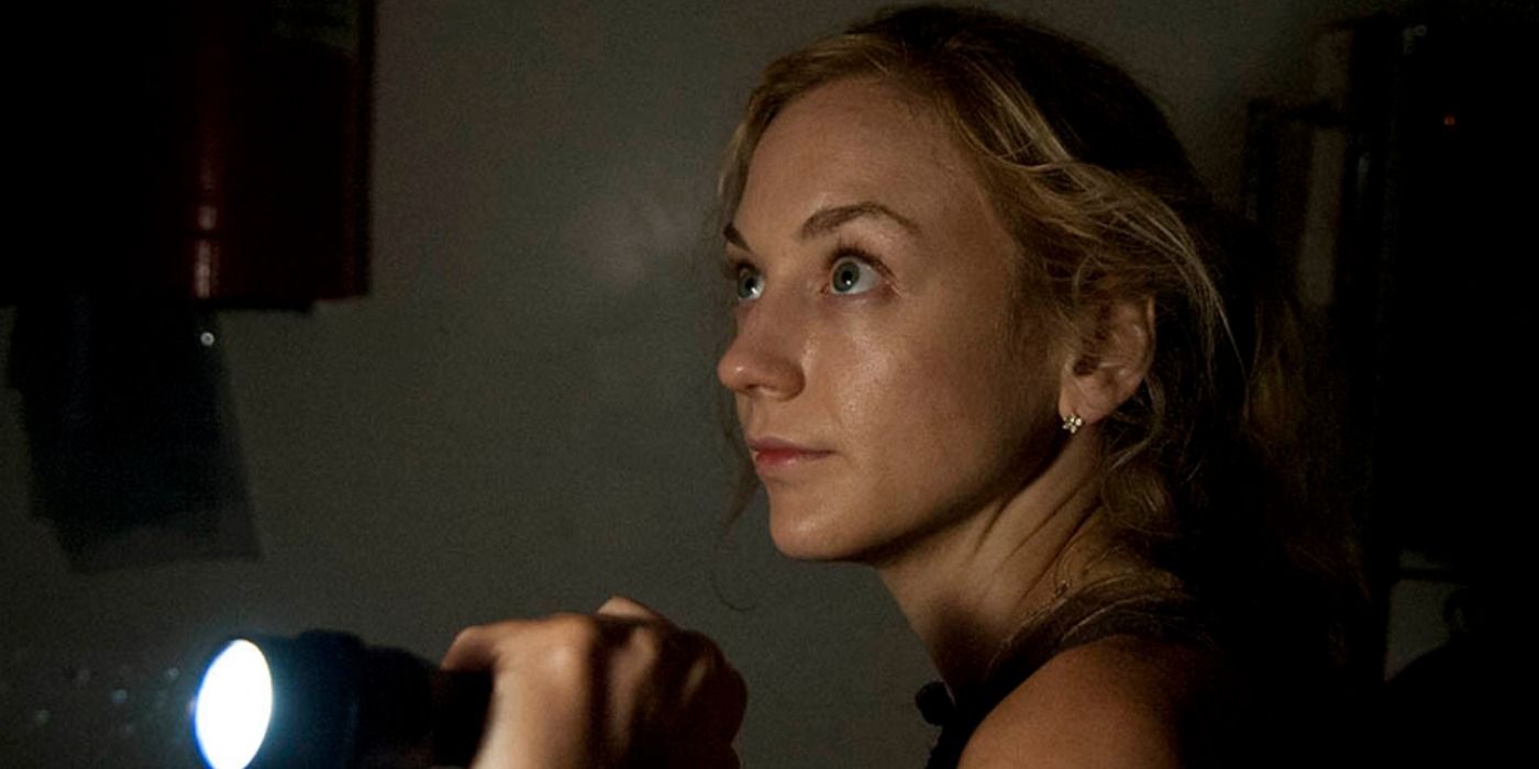 Beth shines a flashlight in The Walking Dead