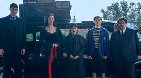 Cast of Wednesday Season 2 in Front of a Car