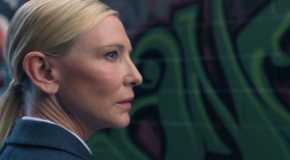 Cate Blanchett as the recruiter in Squid Game looking over her shoulder