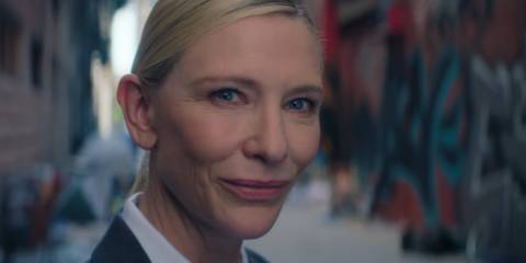 Cate Blanchett as the recruiter smiling in Squid Game season 3, episode 6