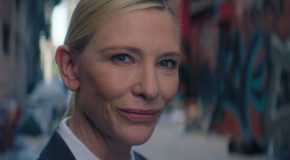 Cate Blanchett as the recruiter smiling in Squid Game season 3, episode 6