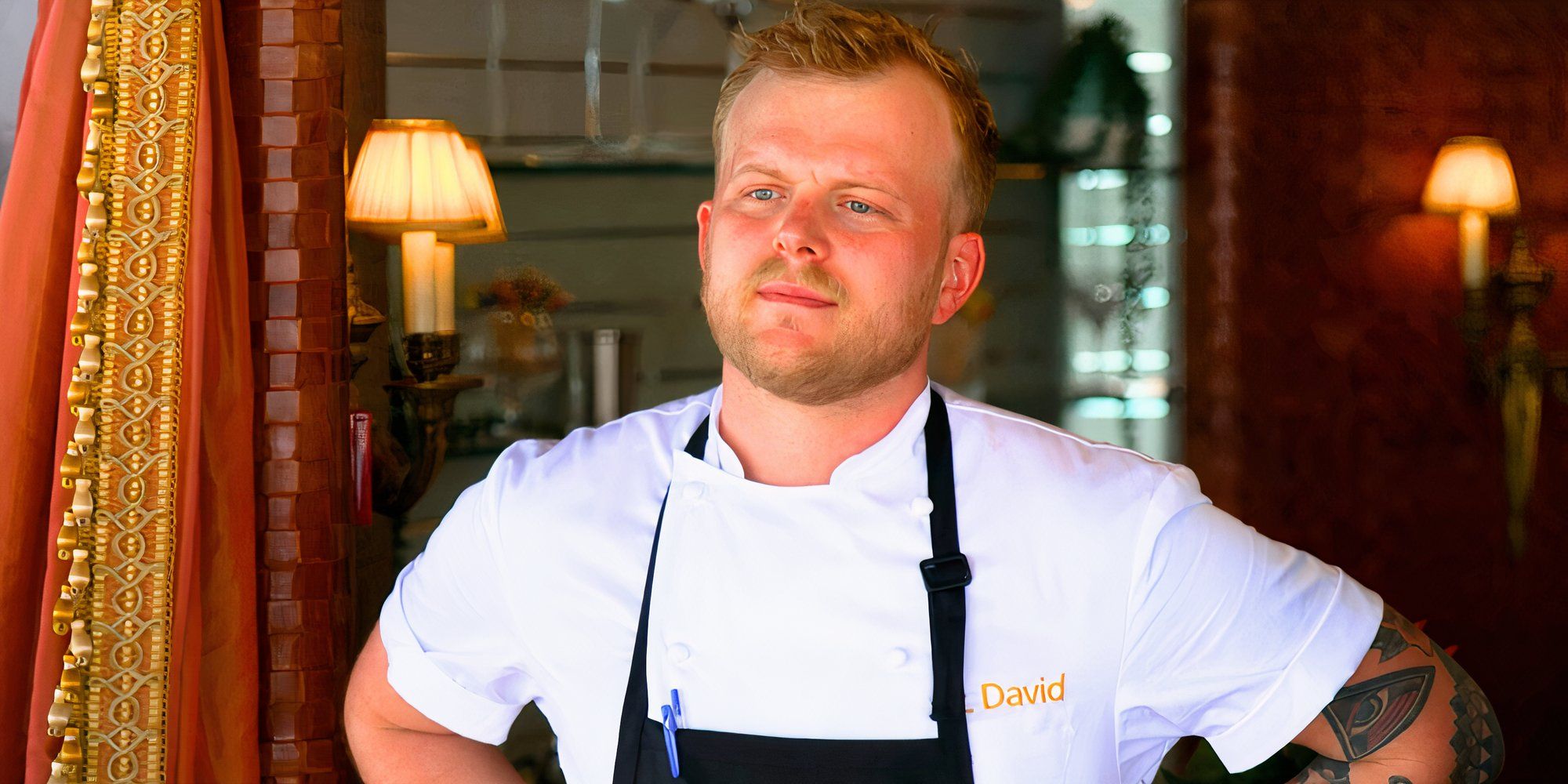 Chef Lawrence stands with his hands on his hips on Below Deck season 12