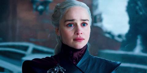 Emilia Clarke as Daenerys Targaryen looking surprised and sad in Game of Thrones