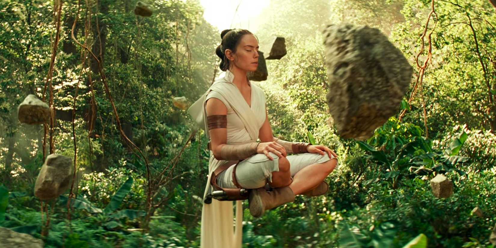 Daisy Ridley as Rey From Star Wars Surrounded by Floating Rocks