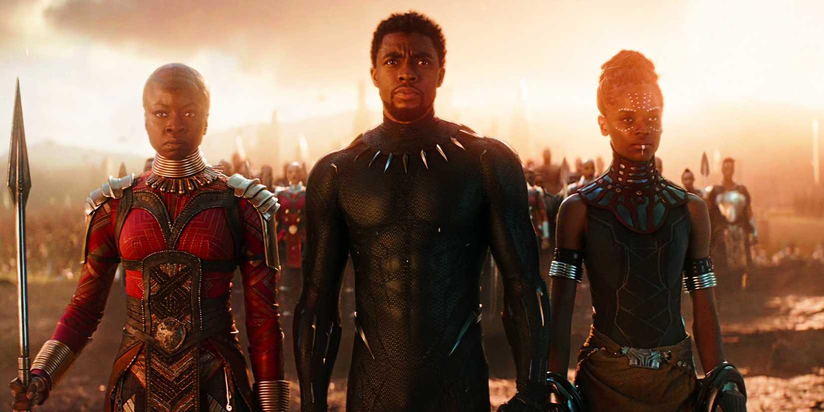 danai gurira as okoye chadwick boseman as black panther and letitia wright as shuri lead wakandan army through a portal in avengers endgame
