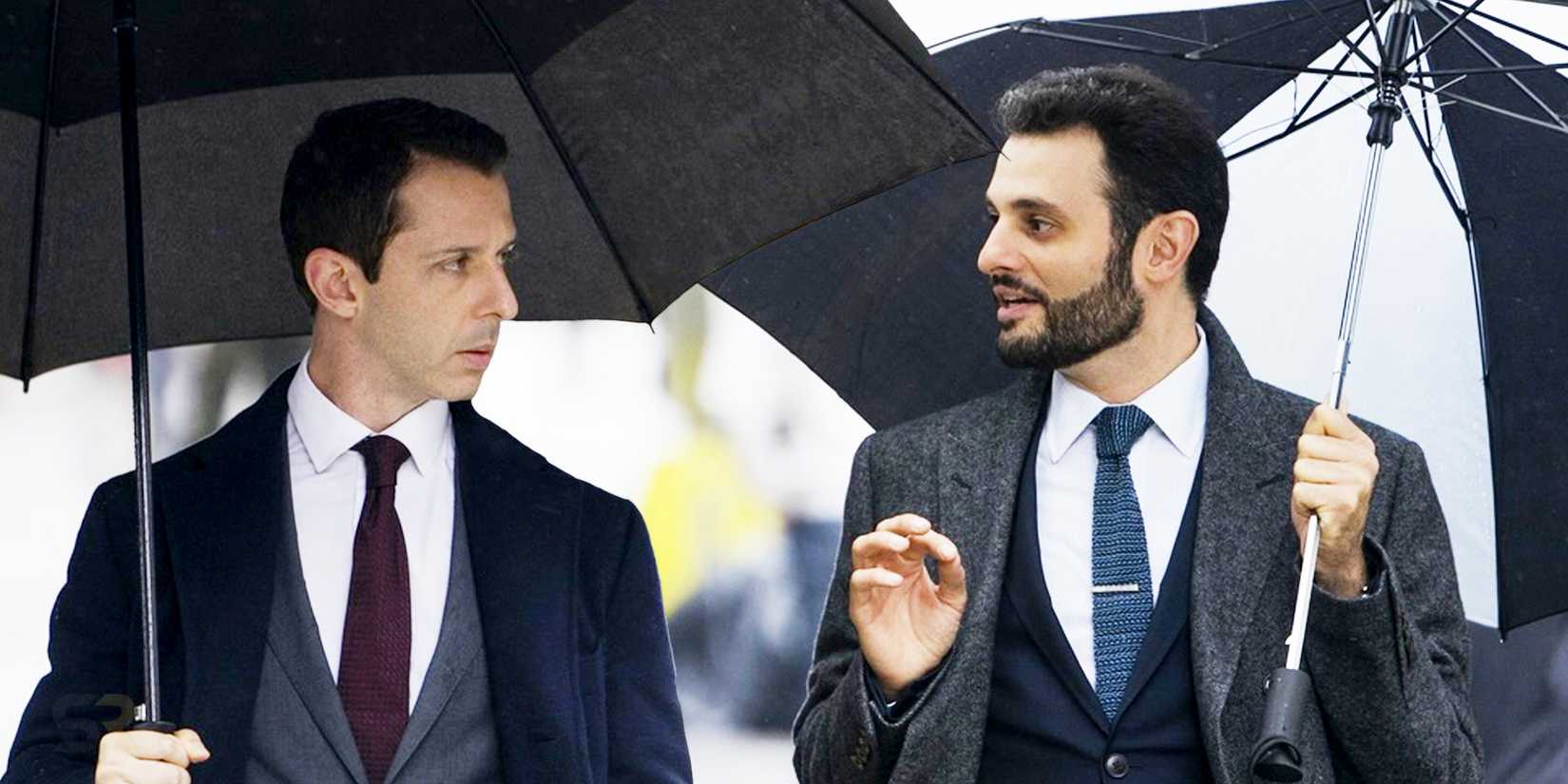 Kendall and Stewy under umbrellas in Succession