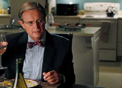 Ducky raising a glass of wine on a date in the NCIS episode Thirst