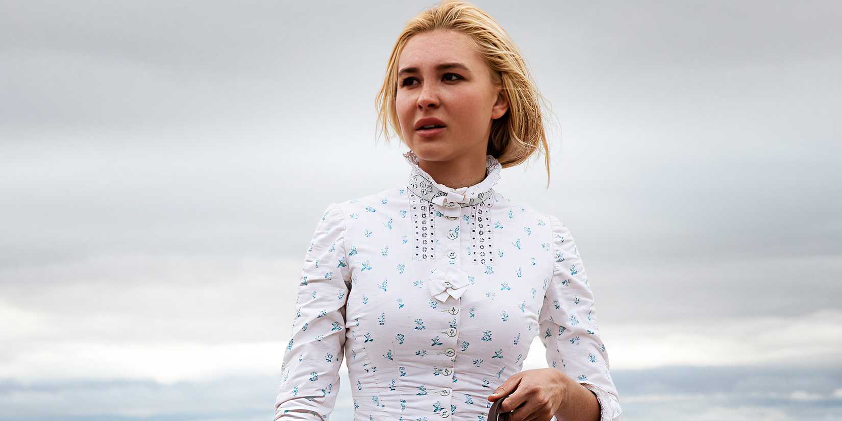 Isabel May as Elsa Dutton in her white high-neck dress in 1883