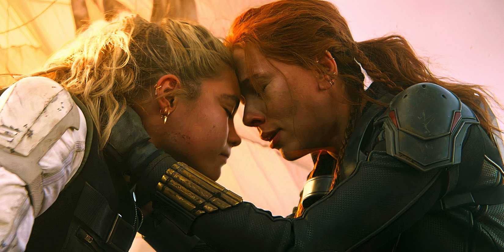 Florence Pugh's Yelena Belova and Scarlett Johansson's Black Widow crying in the MCU Black Widow movie