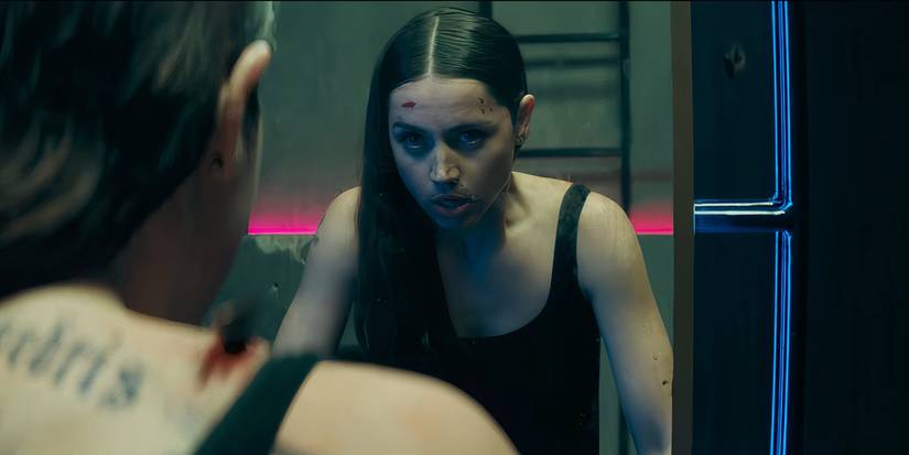 Ana de Armas looks at her bloody reflection in From the World of John Wick: Ballerina