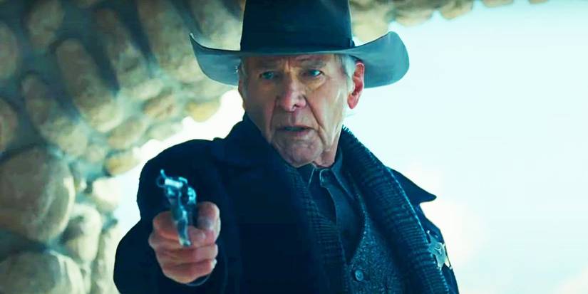 Jacob Dutton (Harrison Ford) apontando uma arma e com uma expressão preocupada em 1923.