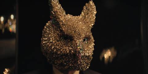 Oh Il-nam wears an owl mask in a Squid Game season 3 flashback