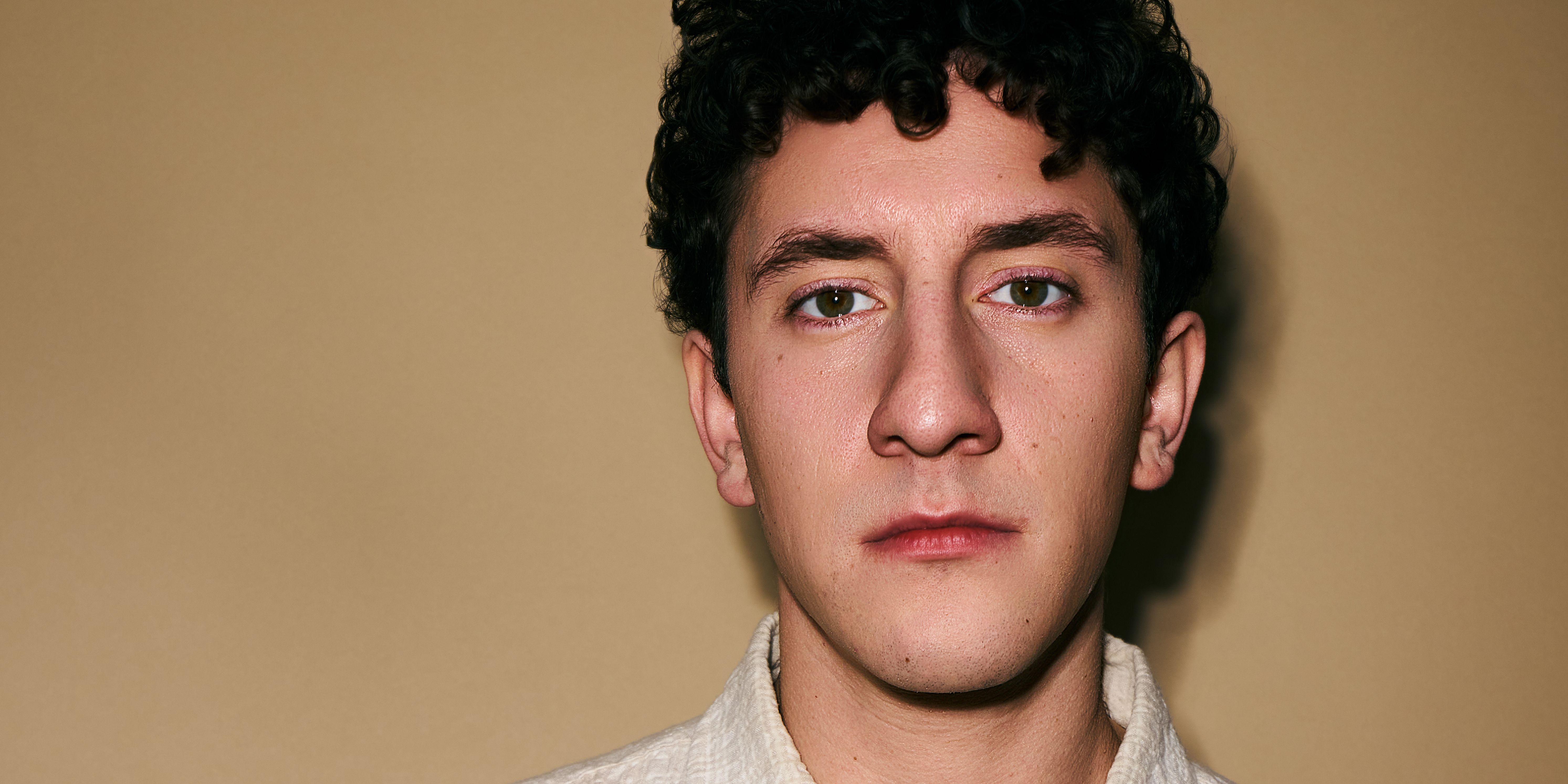 Head shot of Malik Elassal from FX's Adults - cropped