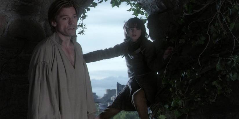 Jaime Lannister about to push Bran Stark out a window in Game of Thrones pilot