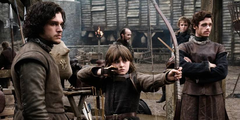 Jon Snow com Bran e Robb Stark no piloto de Game of Thrones