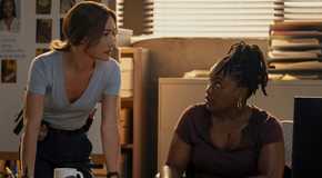 Maggie Q's Renée looking in thought and Courtney Taylor's Samira looking intrigued in Ballard