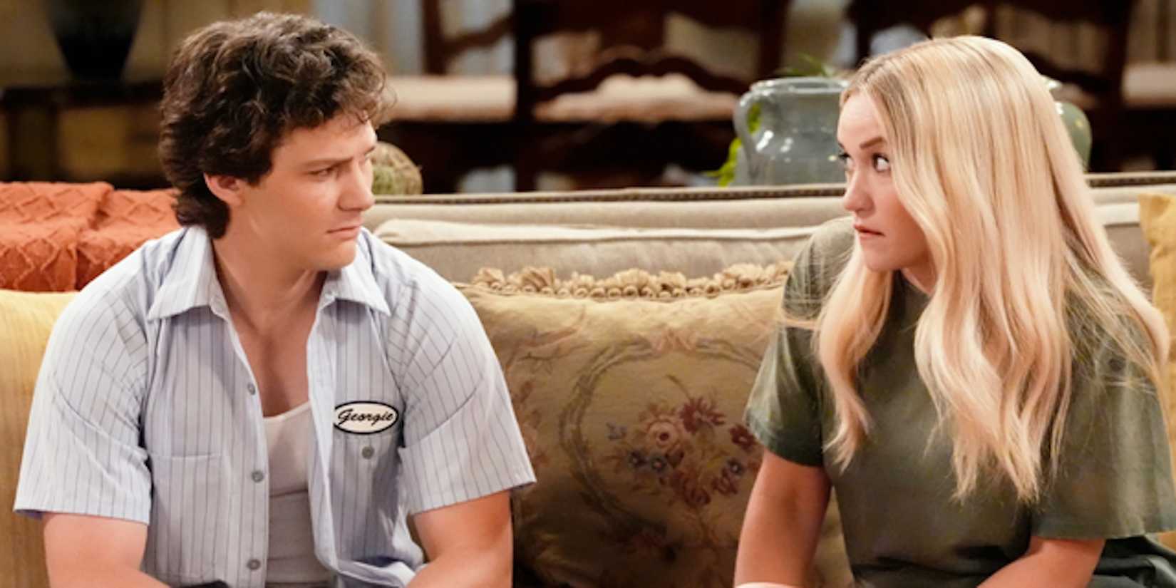 Montana Jordan's Georgie sits on a couch looking sad with Emily Osment's Mandy from Georgie & Mandy's First Marriage