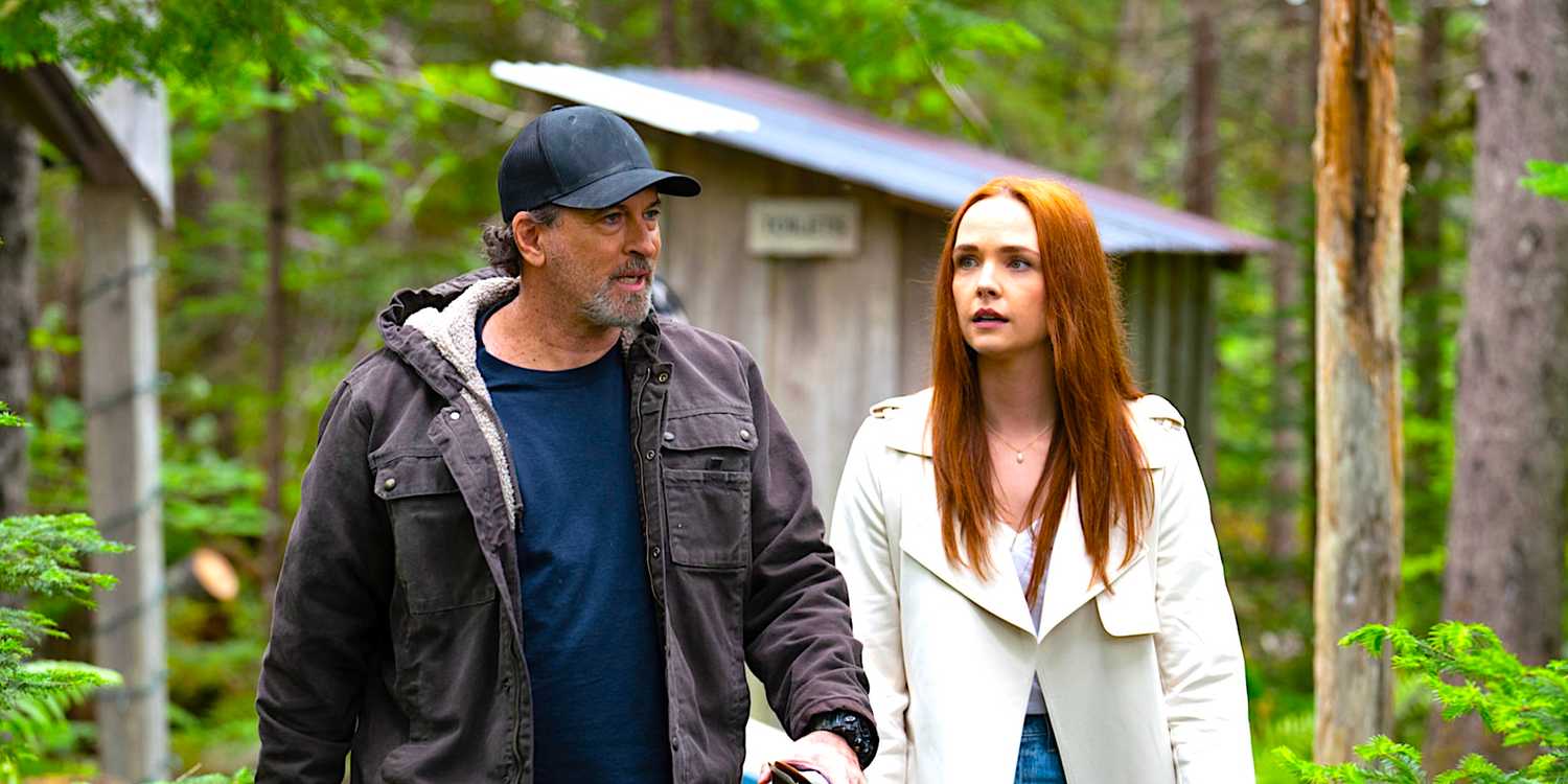 Morgan Kohan's Maggie and Scott Patterson's Sully argue while walking in the woods from Sullivan's Crossing season 1