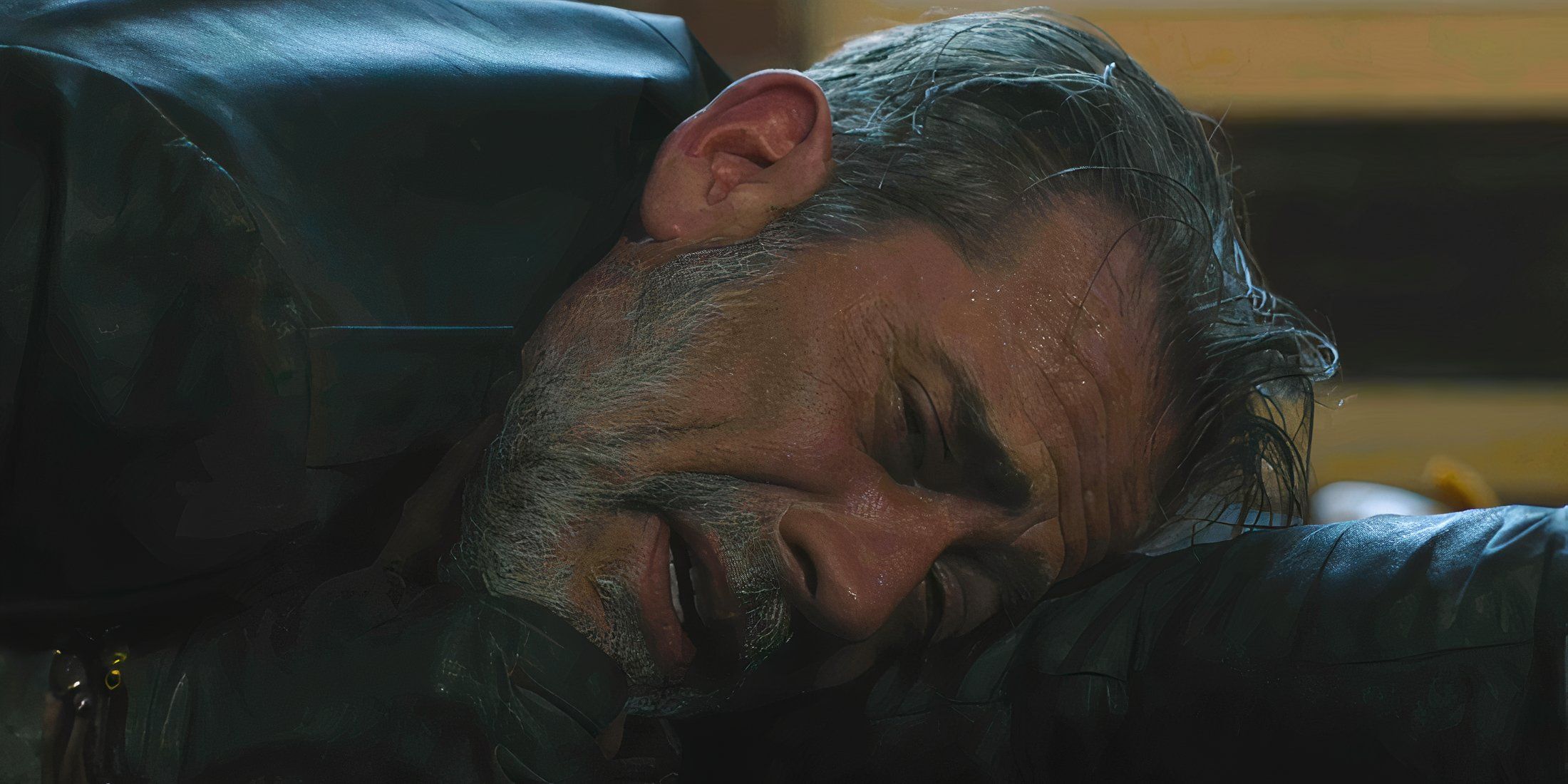 Negan laying on the ground crying in The Walking Dead Dead City season 2 episode 8