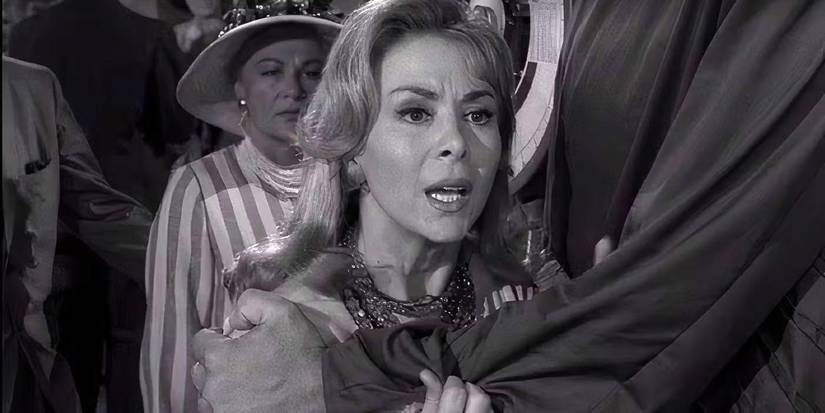 Patty revealing the cookbook twist in The Twilight Zone episode To Serve Man