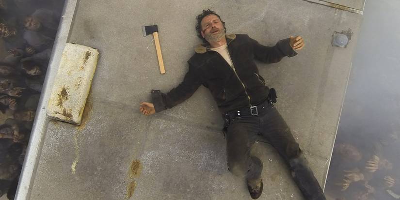 Rick on the roof of an RV in The Walking Dead