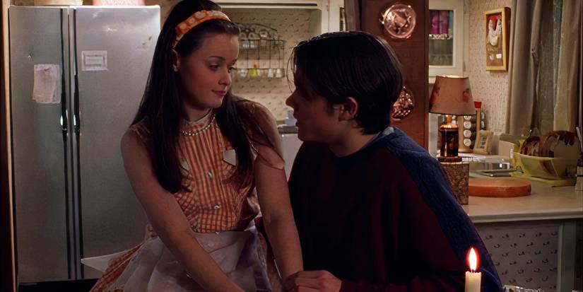Rory And Dean staring into each other's eyes In Gilmore Girls' "That Damn Donna Reed"