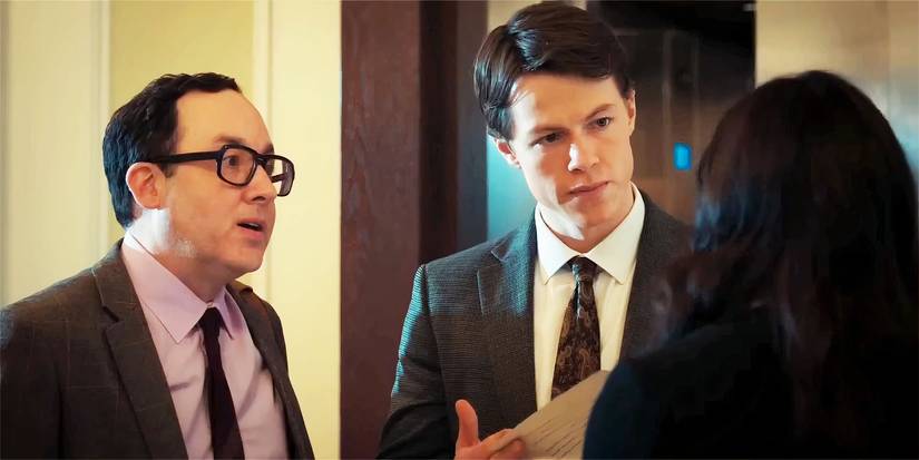 Rudy and Deck talking to their boss in The Rainmaker