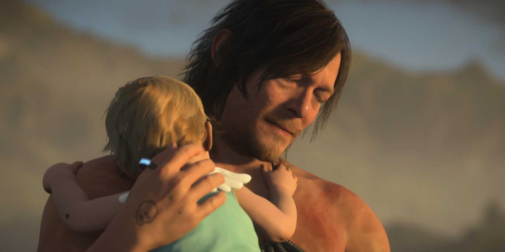 Sam holding Lou in Death Stranding 2 while looking forlorn.